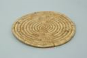 Image of round coiled grass mat, plain